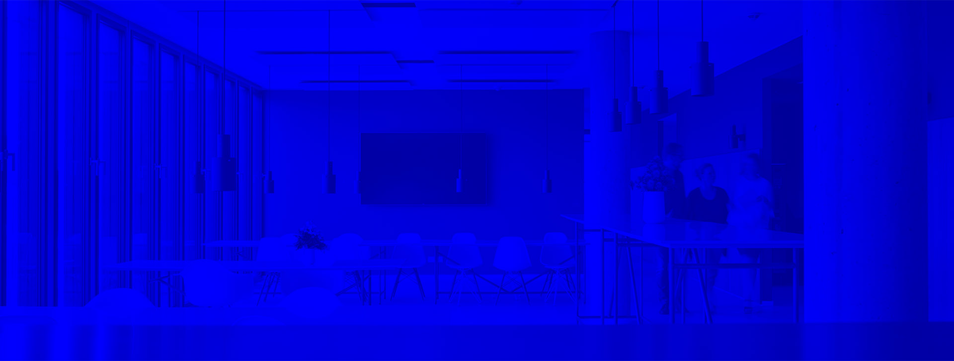 Room with white tables and chairs, on the right side three people are walking through the picture, blue filter